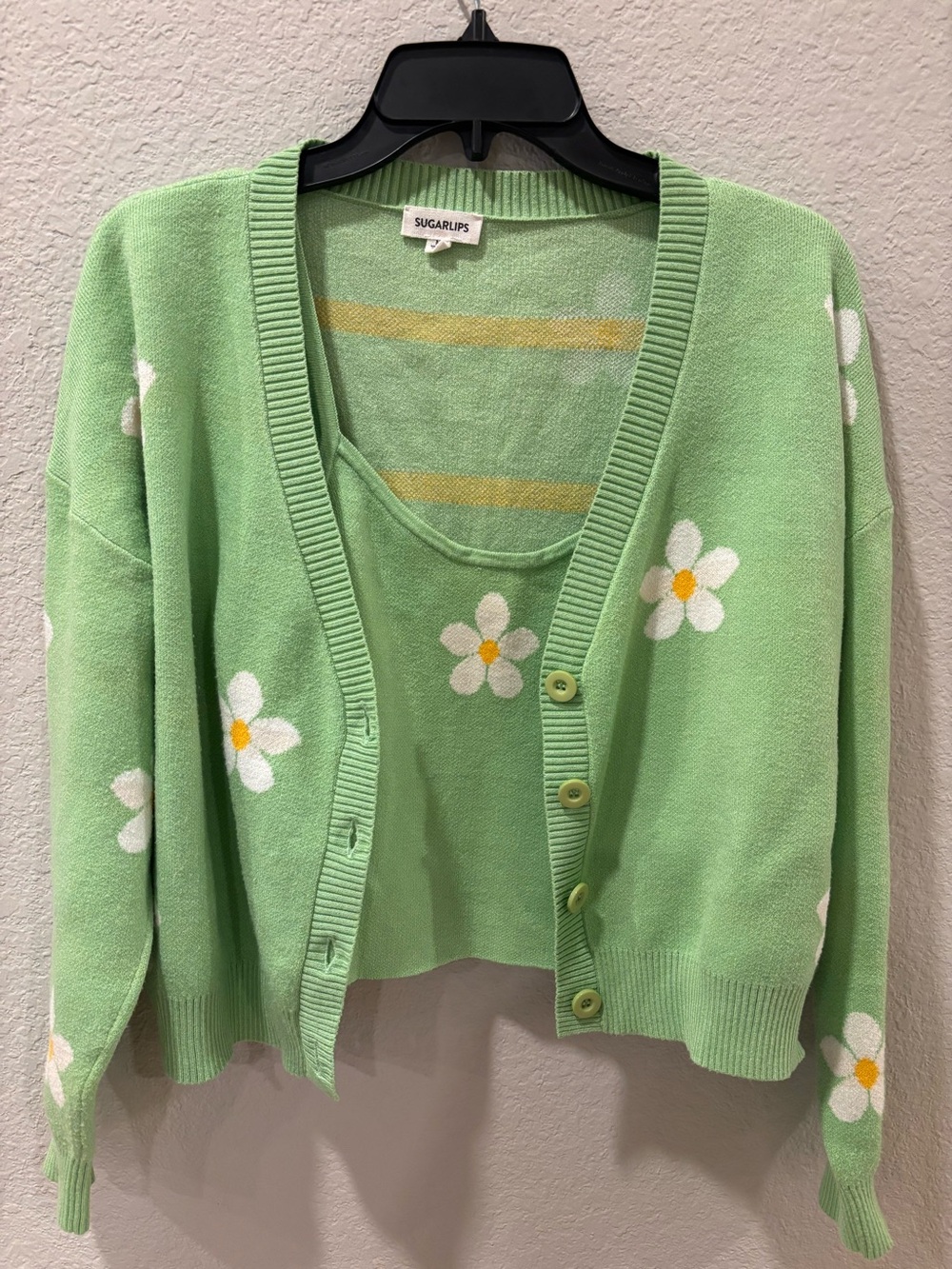 Sugarlips Daisy Mae
Cropped cardigan with matching Cami size Medium